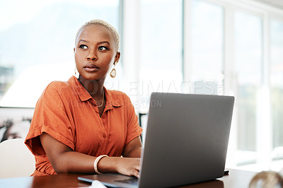 Buy stock photo Thinking, online and black woman with laptop, serious and typing of ideas in office and copywriting. Writer, working and creative for website on desk, reading and confident in company and person