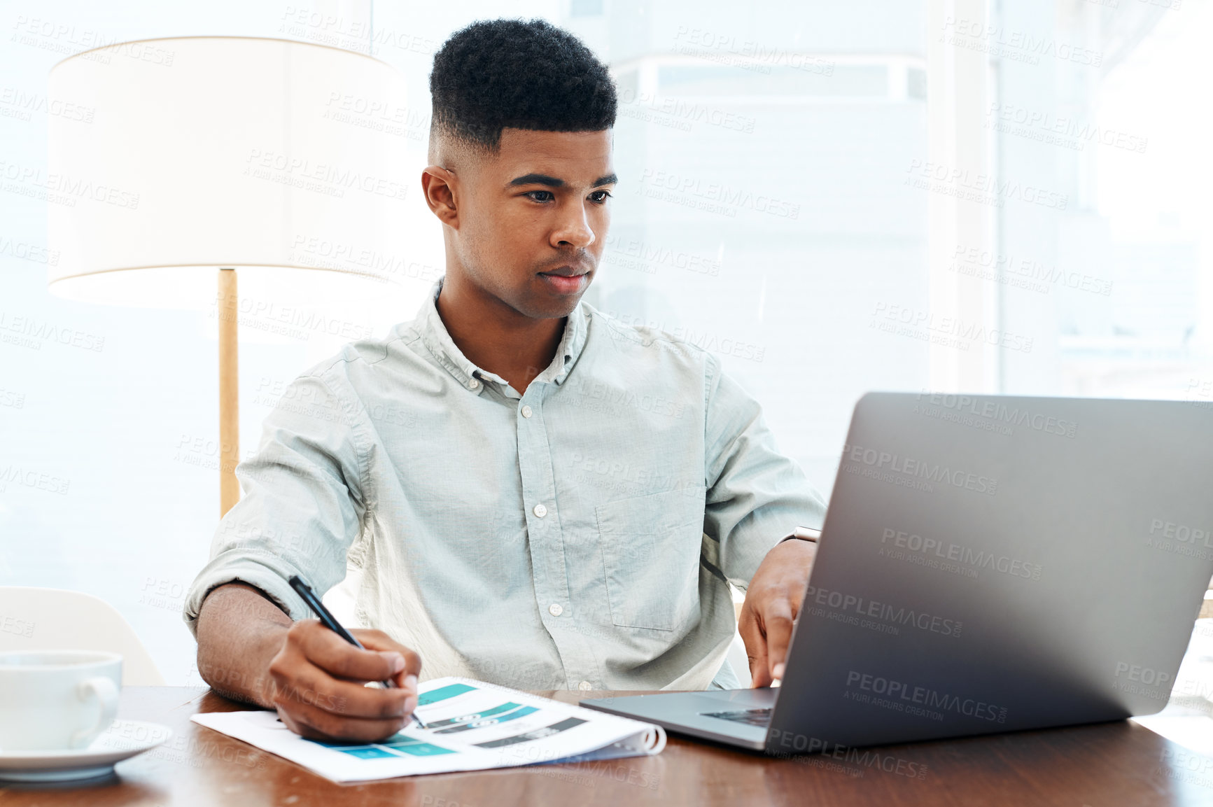 Buy stock photo Online, document and business man at desk for proposal, project review or budget plan. Professional, media agency and African male employee with paperwork for report, startup or notes in office