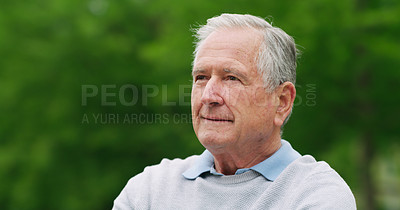 Buy stock photo Shot of a senior man spending a day in the park
