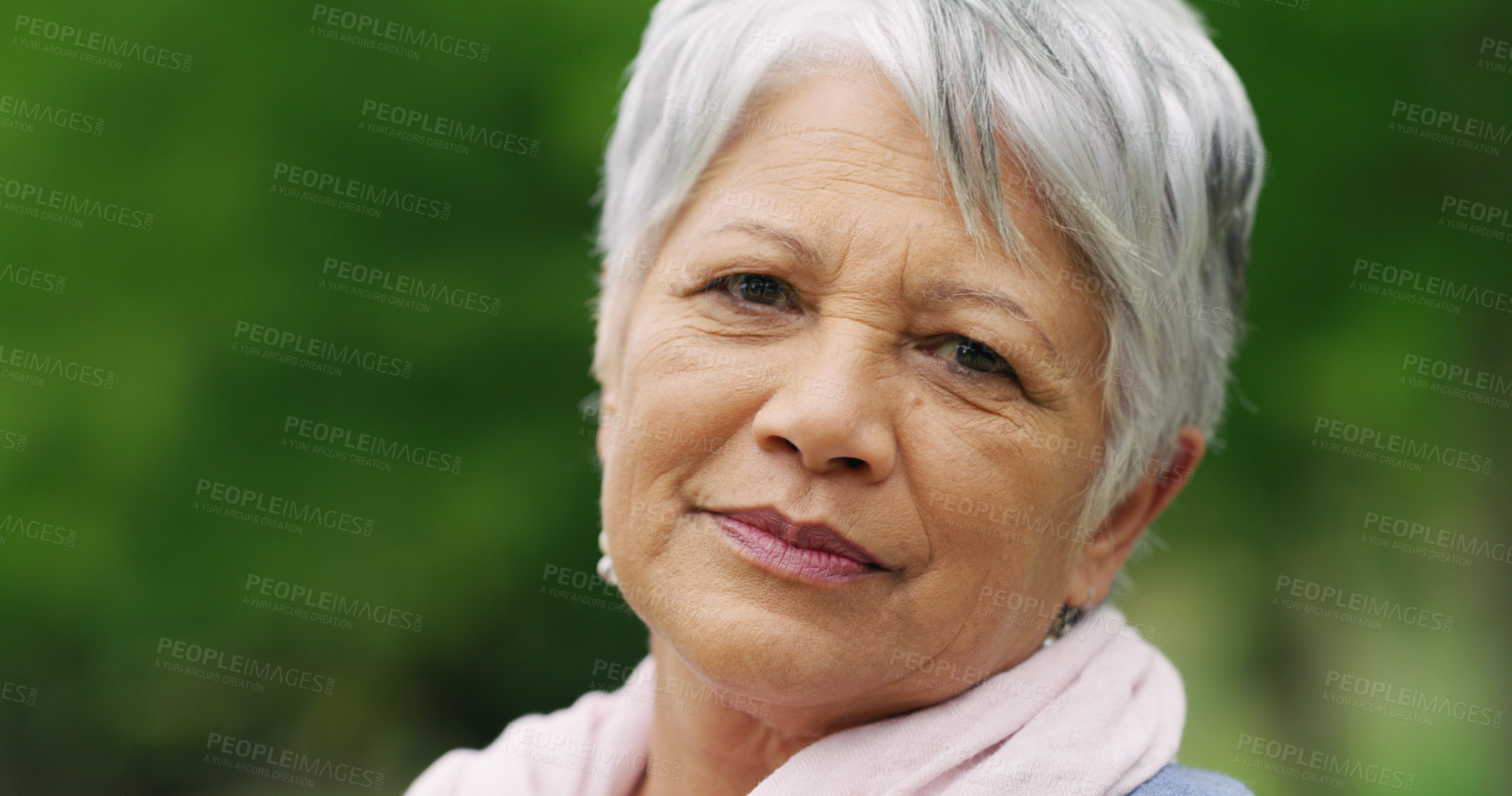 Buy stock photo Portrait of a senior woman spending a day in the park