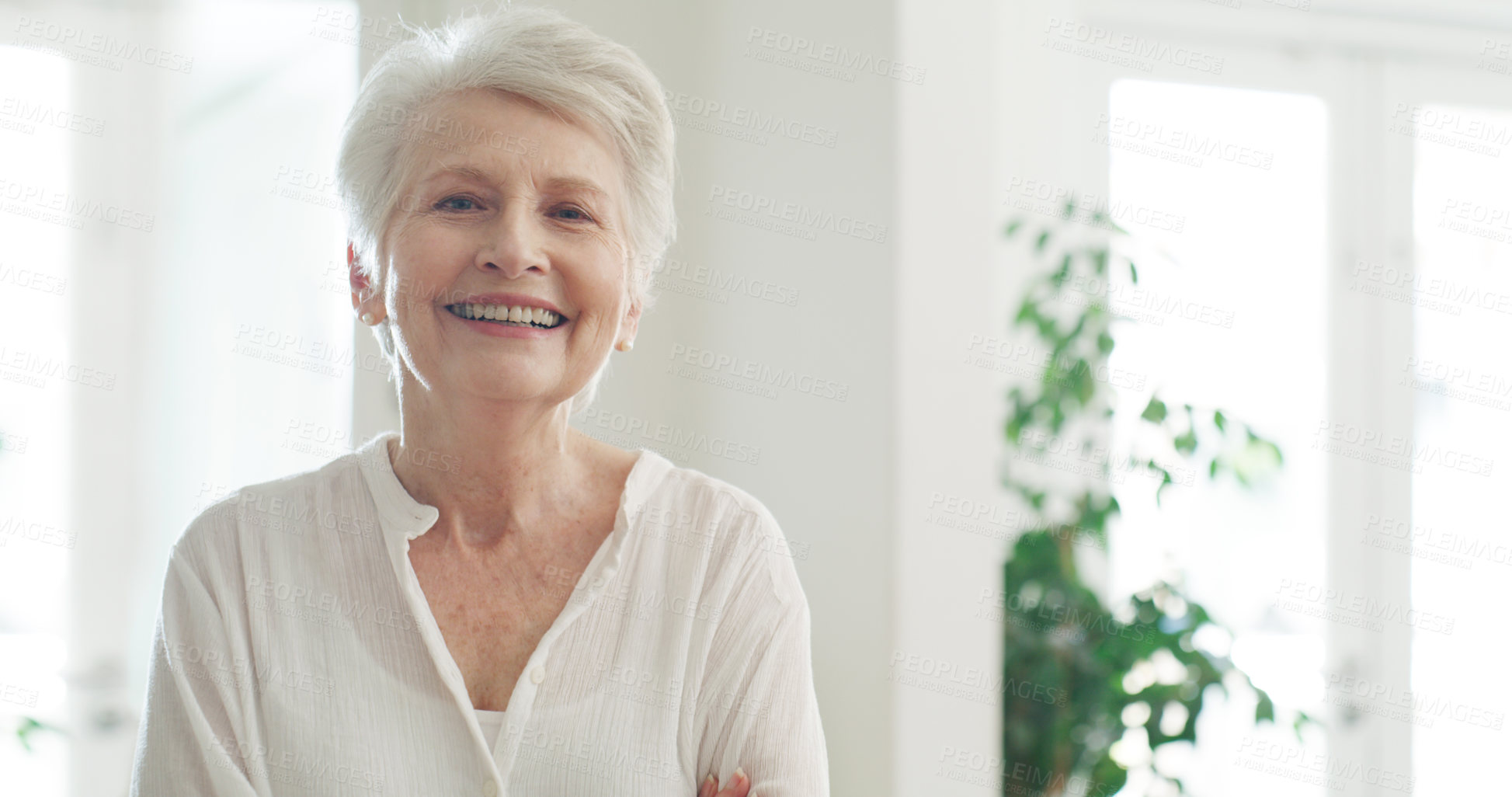 Buy stock photo Portrait of a beautiful senior woman smiling at home