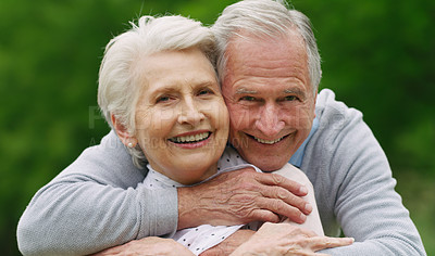 Buy stock photo Shot of a happy senior couple spending a romantic day in the park