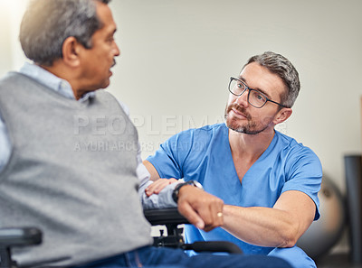 Buy stock photo Hospital, wheelchair and nurse with old man for consulting, support and recovery for wellness. Healthcare, talking and caregiver with elderly person with disability for rehabilitation and healing