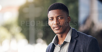 Buy stock photo Portrait of a young businessman standing outdoors