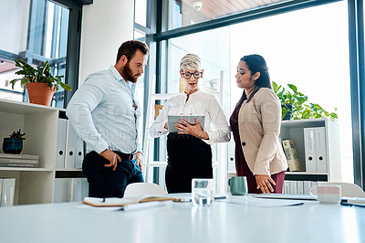 Buy stock photo Planning, meeting and business people on tablet in office for discussion, talking and feedback. Professional, corporate and workers on digital tech for research project, online website and teamwork