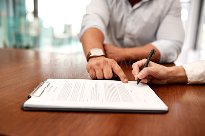 Buy stock photo Hands, business people and help to sign paperwork at office for partnership, deal and contract agreement. Closeup, desk  and legal documents for policy compliance, employment conduct and onboarding