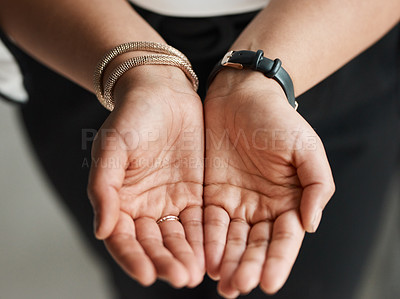 Buy stock photo Closeup shot of an unrecognisable businesswoman standing with her hands cupped together