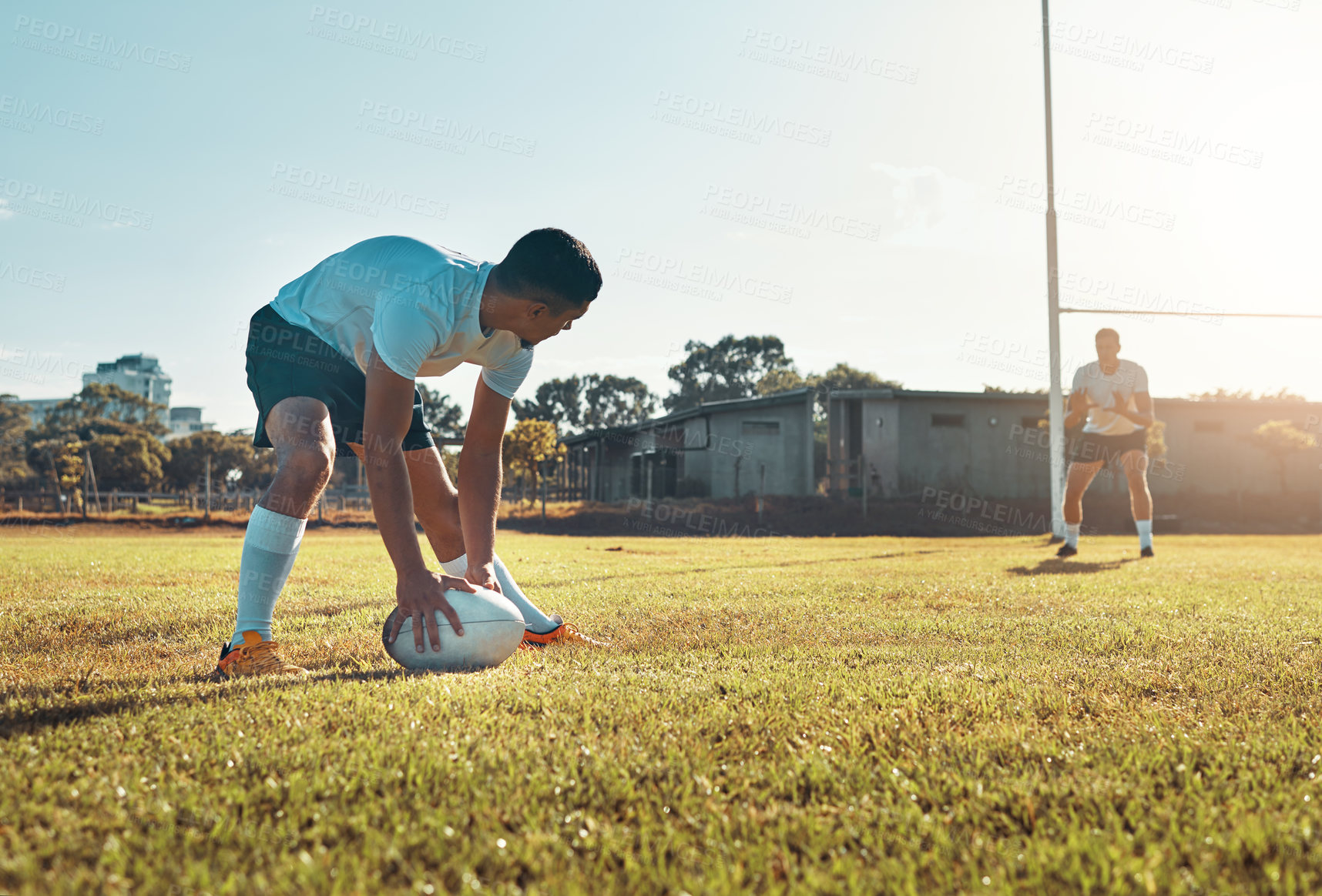 Buy stock photo Rugby, sports and playing game on field for pass, teamwork and exercise with ball, grass and workout. Athlete, people and fitness outdoor for competition, practice or training with skill development 