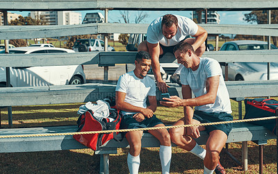 Buy stock photo Rugby, players and phone on pavilion for sports, practice and development skills with video, app and bag. Exercise, fitness and athlete people outdoor for conversation, teamwork and tips on game play