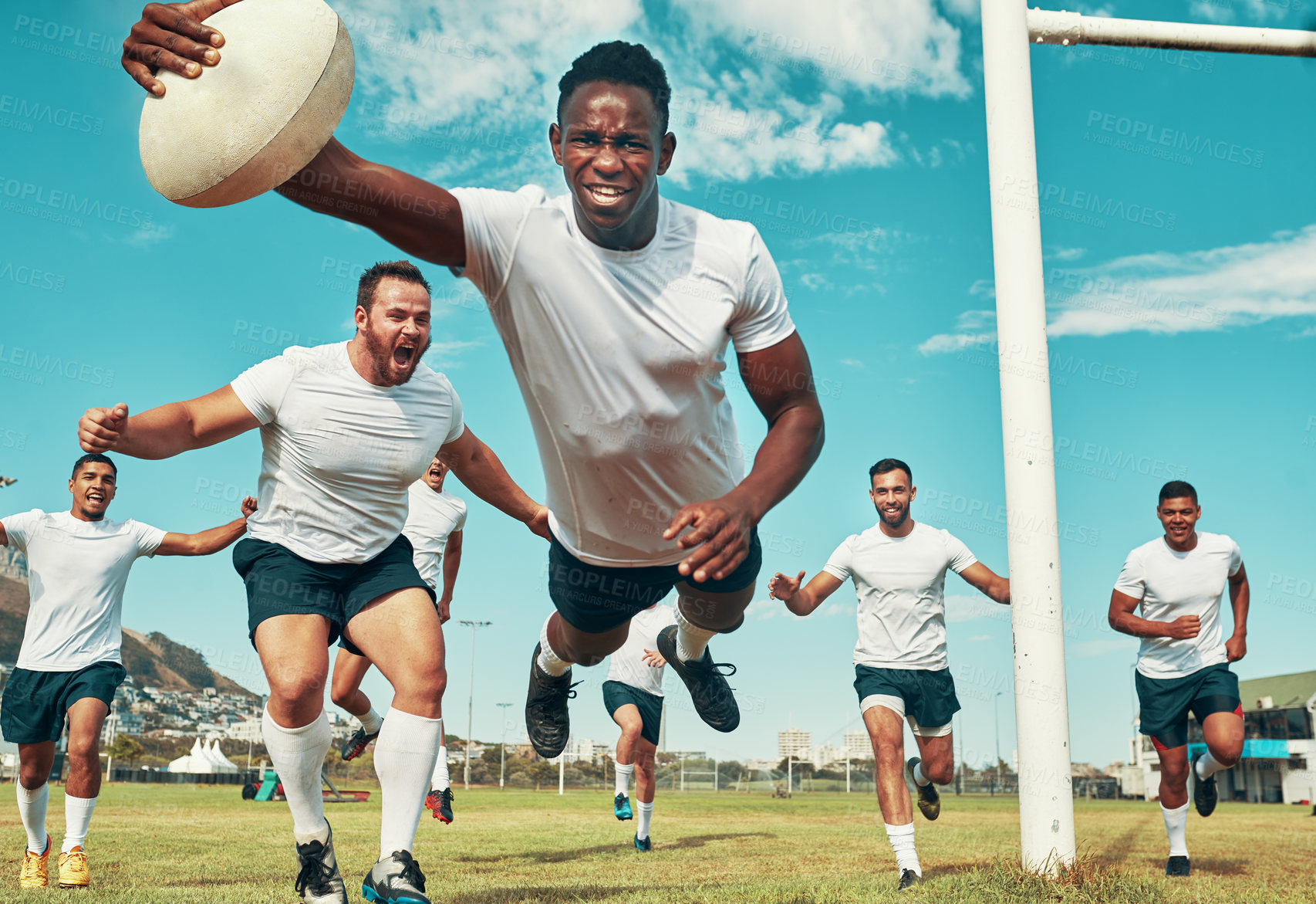 Buy stock photo Rugby, try or men on field to score for practice training, competition or game routine on pitch. Jump, athletes or agile players in sports stadium with teamwork for workout, match or fitness exercise