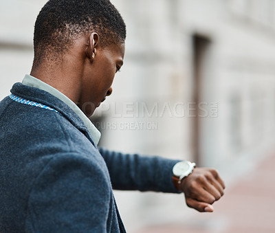 Buy stock photo Running late, checking time on watch and feeling stressed, anxious and in hurry to get to work. Rushing entrepreneur in city, town or downtown missing a morning office appointment or public transport