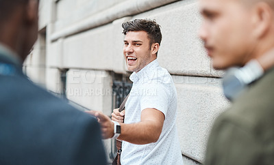 Buy stock photo Startup entrepreneur feeling happy and excited while outside with his team looking for opportunity. Motivated and dedicated small business colleagues laughing and smiling while feeling ambitious