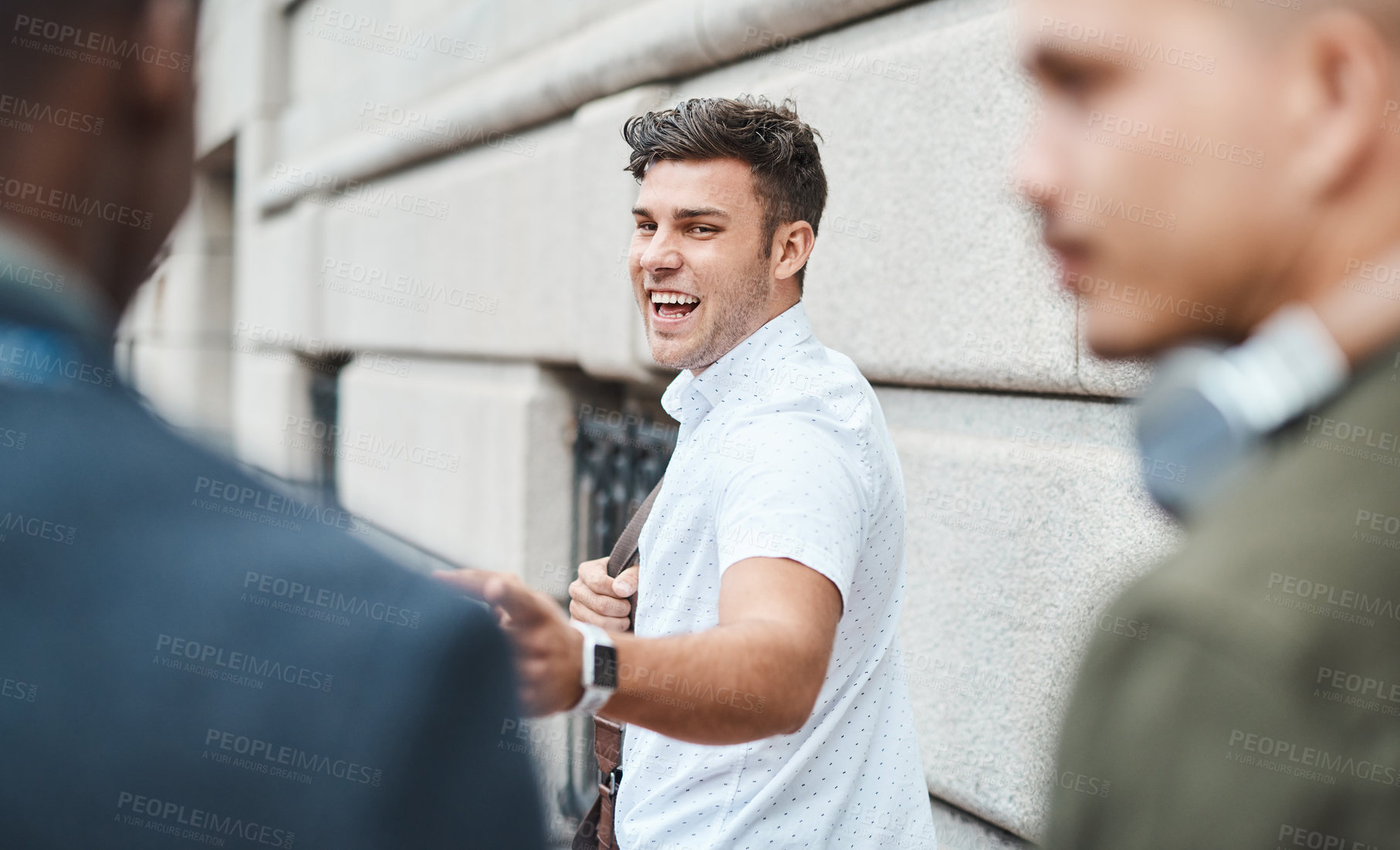 Buy stock photo Startup entrepreneur feeling happy and excited while outside with his team looking for opportunity. Motivated and dedicated small business colleagues laughing and smiling while feeling ambitious