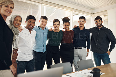 Buy stock photo Cropped portrait of a group of business colleagues standing in their office boardroom