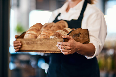 Buy stock photo Bakery, box and hands of baker with bread in cafe for serving food, products and pastry for small business. Restaurant, shop and person for service, help and baked goods for hospitality in store