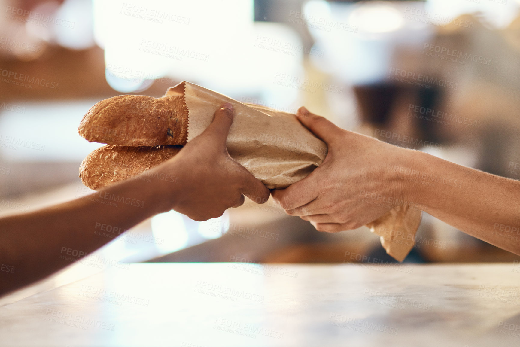 Buy stock photo Customer buying bread from bakery, purchasing baked goods and shopping for food at a shop. Hands of female client and employee giving service, taking product and helping with item at grocery store