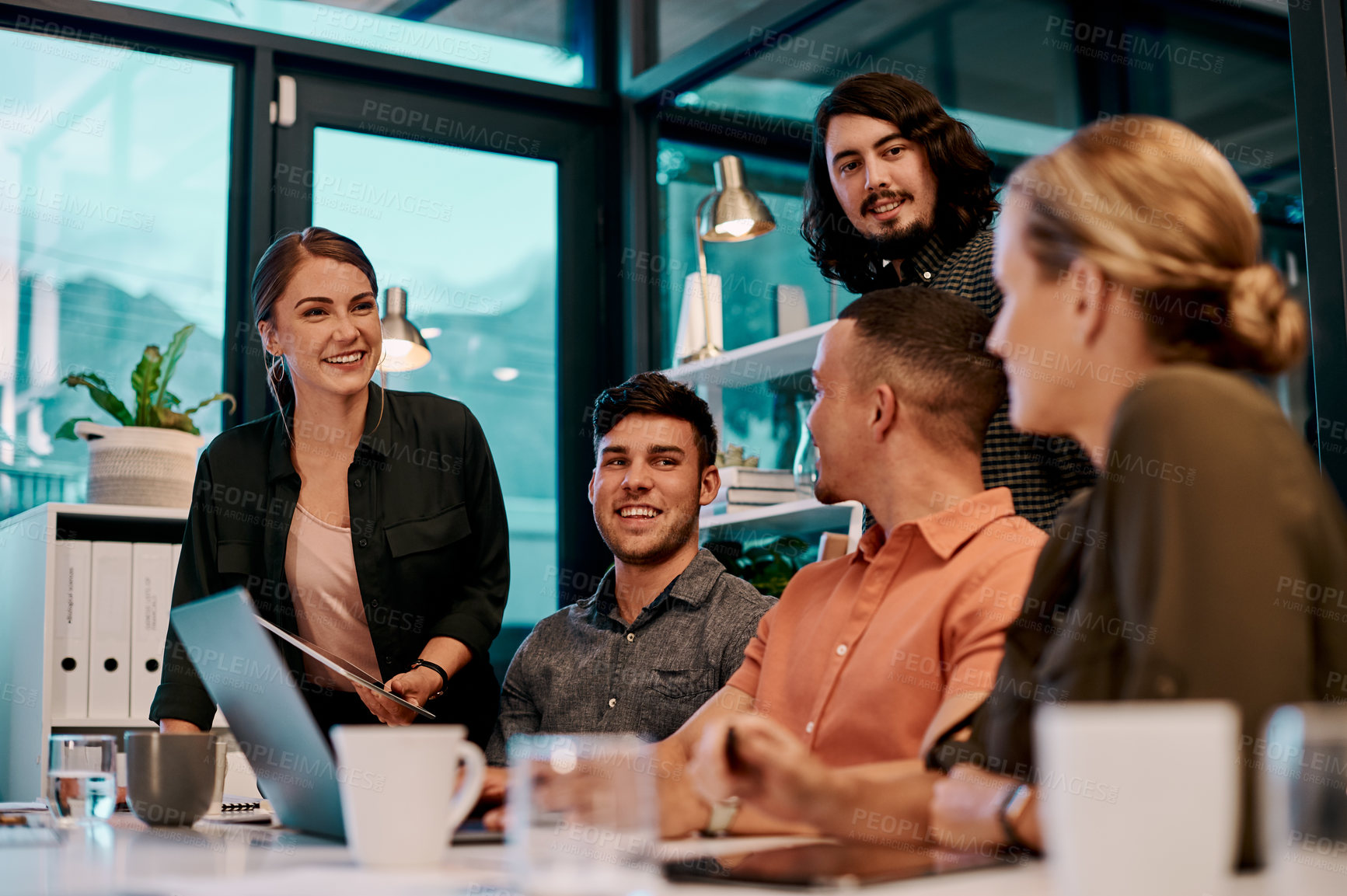 Buy stock photo Shot of a group of businesspeople having a meeting in the boardroom