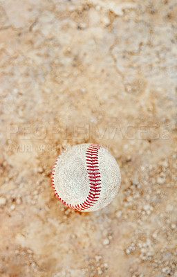 Buy stock photo Still life shot of a baseball ball on the pitch outdoors during the day