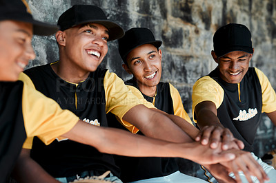 Buy stock photo Cropped shot of a group of young baseball players sitting together on the bench during a game