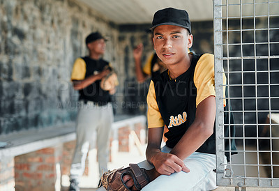Buy stock photo Portrait of a confident young baseball player sitting in the dugout