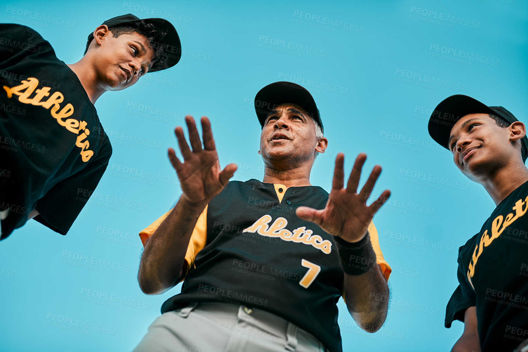 Buy stock photo Coach, boys and serious with baseball player in conversation for team building, support or motivation. People, sports and low angle with game planning for practice, training and tournament or match