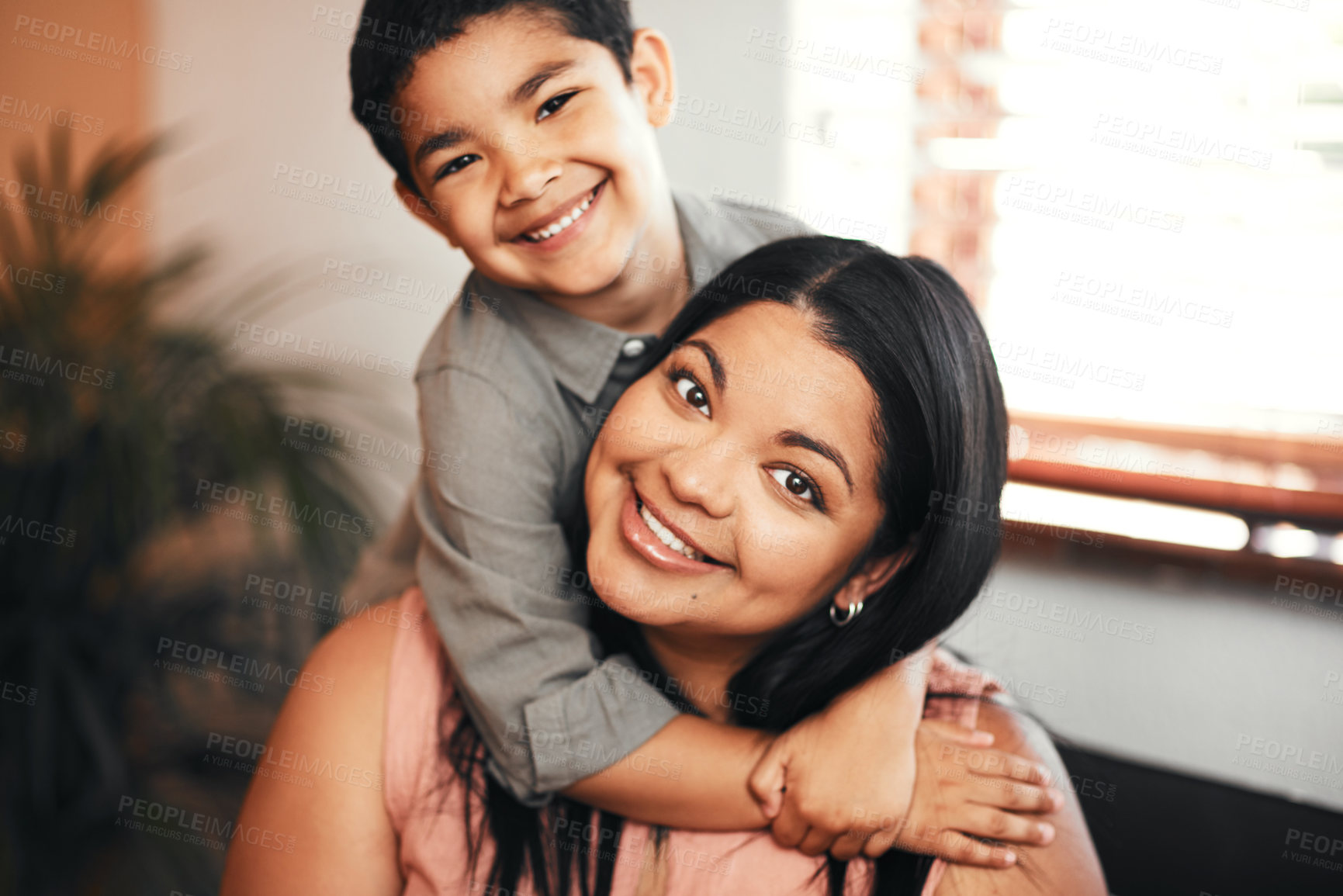 Buy stock photo Portrait of a mother and her little son bonding together at home