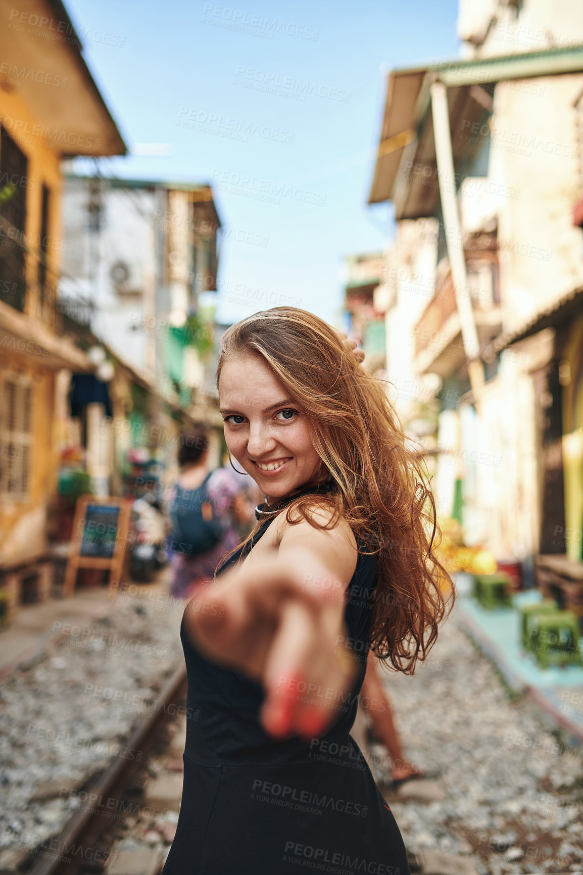 Buy stock photo Shot of a beautiful young woman exploring a foreign city
