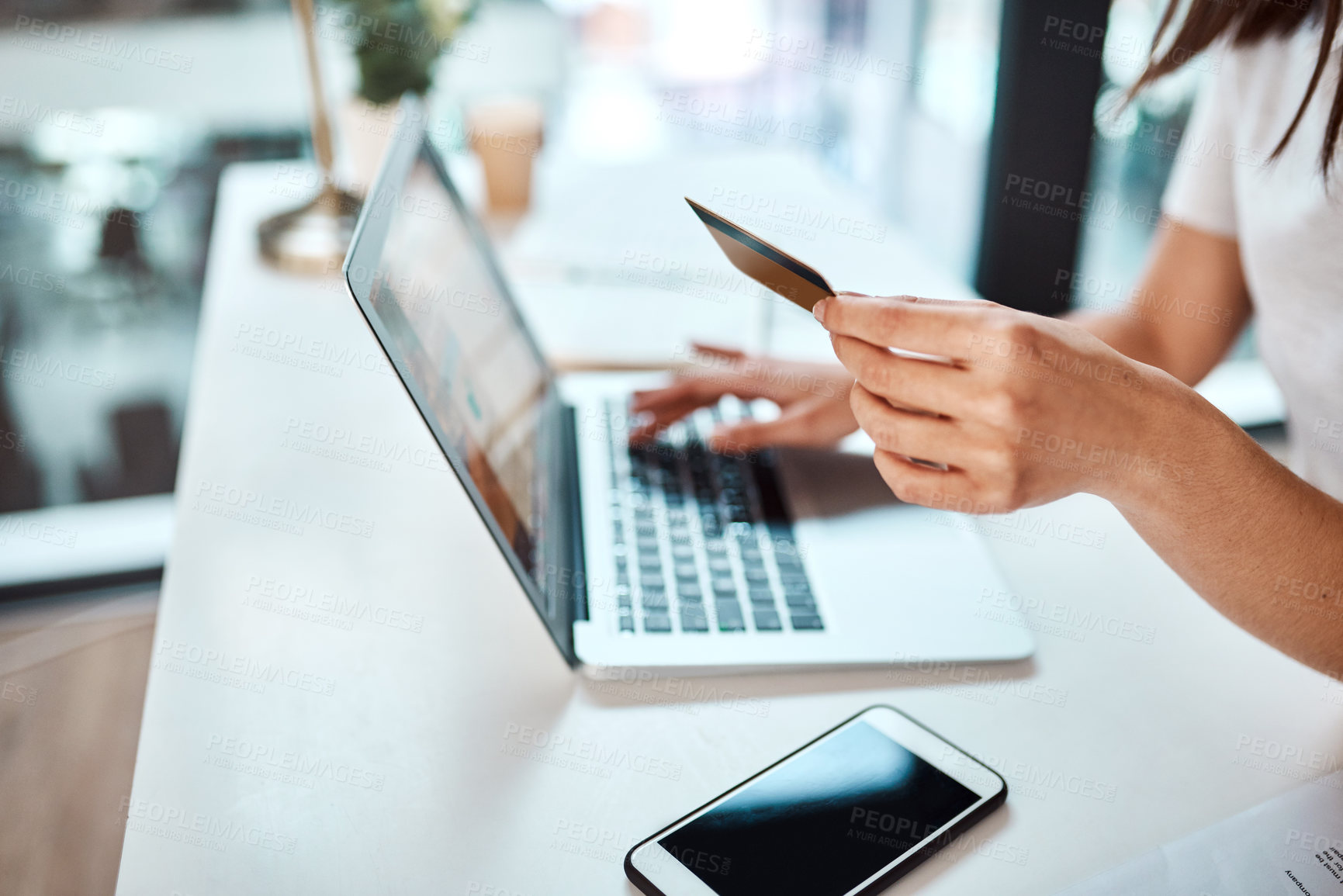 Buy stock photo Woman, hands and credit card with laptop in office, typing bank pin and online for account info. Female person, professional and payment for company purchase, business bills and investment revenue