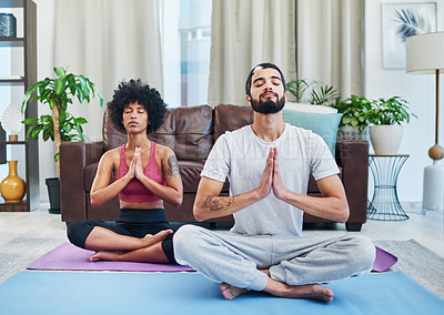 Buy stock photo Namaste, yoga and couple in home for meditation, mindfulness exercise or prayer hands. Relax, interracial man and woman breathe for peace, calm or spiritual wellness for body health, zen or fitness