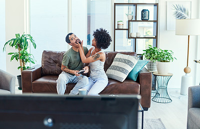 Buy stock photo Man, woman and video gaming with attention for esports, funny and playful in home for bonding. Couple, controller and together in living room on weekend for competition, connection and relationship