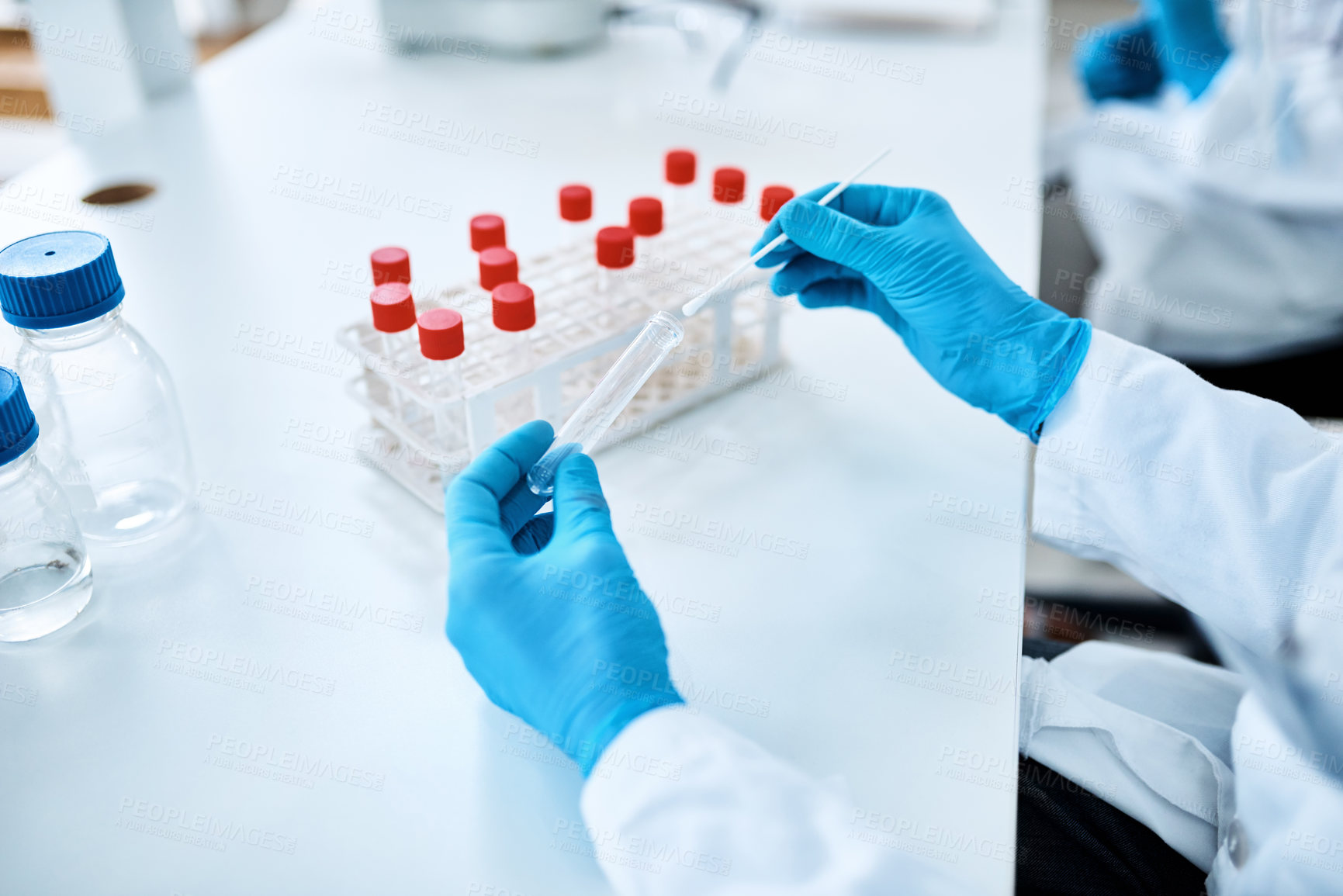 Buy stock photo Hands, ppe and sample in science laboratory with gloves for testing, forensic and analysis in study. Person, scientist and swab for microbiology, biotech and results as virus in pandemic or outbreak