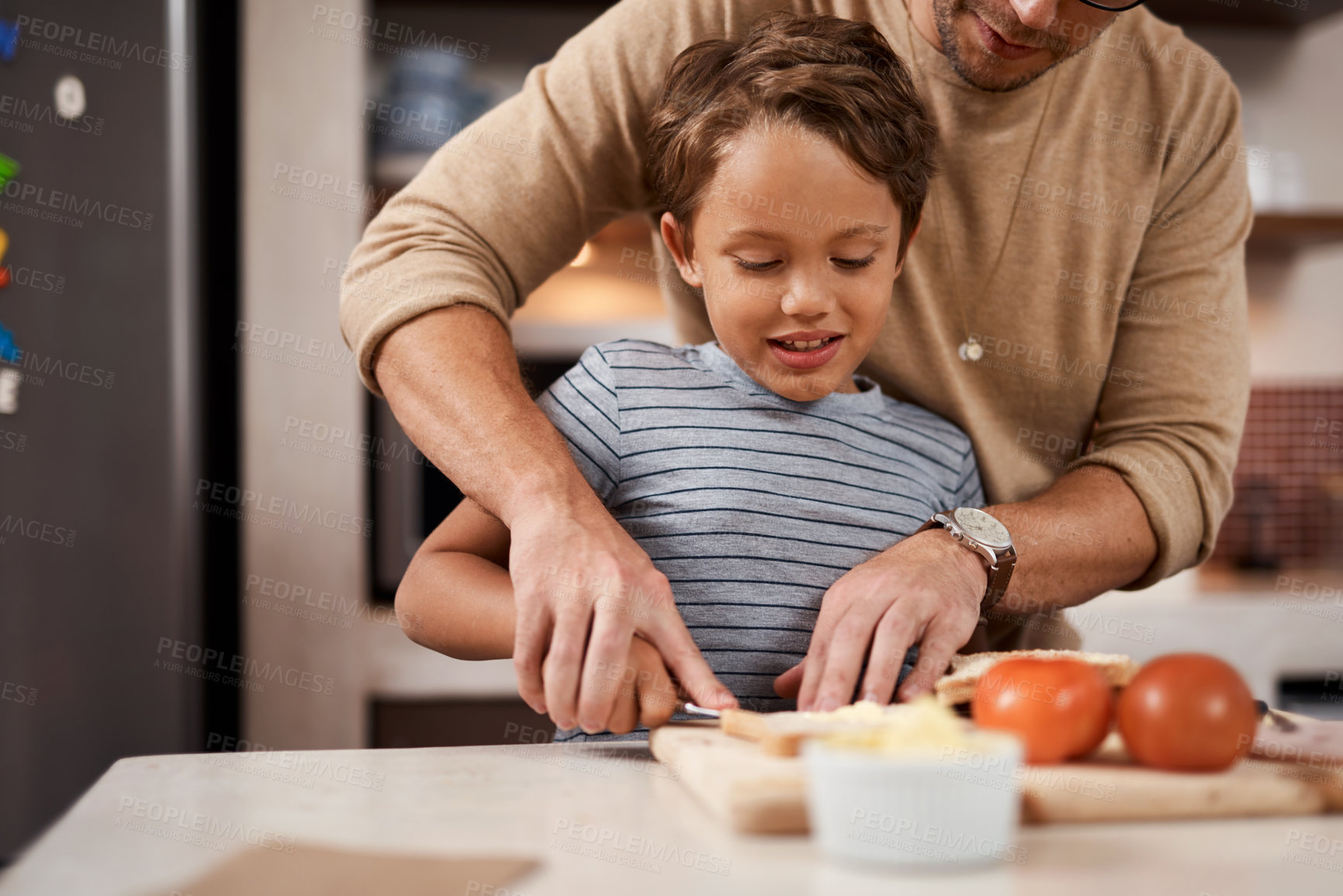 Buy stock photo Learning, sandwich and father with child in kitchen at home with ingredients for breakfast. Happy, teaching and dad helping boy kid prepare bread for morning meal or food for nutrition at house.