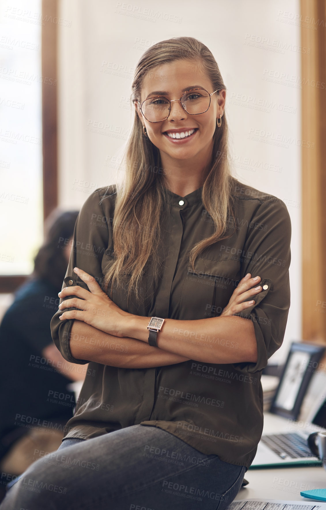 Buy stock photo Proud, confident and ambitious portrait of smiling leader at desk looking professional. Elegant, fashionable and successful woman with stylish glasses has a presentable style at the office. 