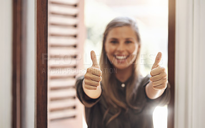 Buy stock photo Thumbs up from a happy woman smiling while showing a hand winning gesture in a modern office. Cheerful, positive  female looking excited after getting good news, feedback or a promotion at work