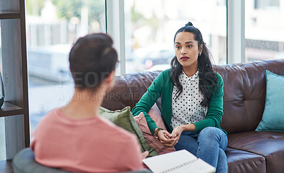 Buy stock photo Mental health, therapy or counseling with a man psychologist and female patient talking in his office. Psychology, wellness and trust with a male doctor or therapist consulting a woman for healing