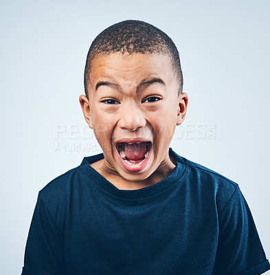 Buy stock photo Shout, scream and portrait of child in studio with anger, upset and mad reaction on white background. Frustrated, facial expression and isolated young boy with behavior, unhappy and bad attitude