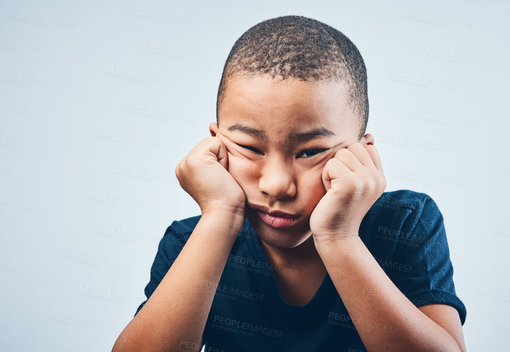 Buy stock photo Portrait, tired and sad with boy, kid and facial expression on gray studio background. Face, childhood and model with emotion, reaction or depression with mental health, boredom or grief with burnout