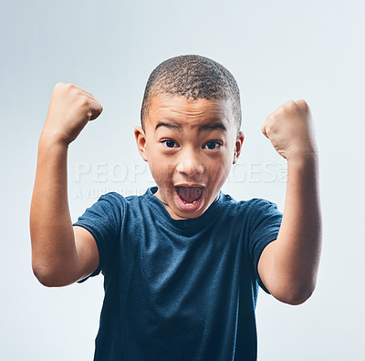 Buy stock photo Portrait, boy and energy in studio with fist for flexing arm with joy and confidence in Brazil on white background. Male person, pride and happy for fitness, exercise and strength with biceps