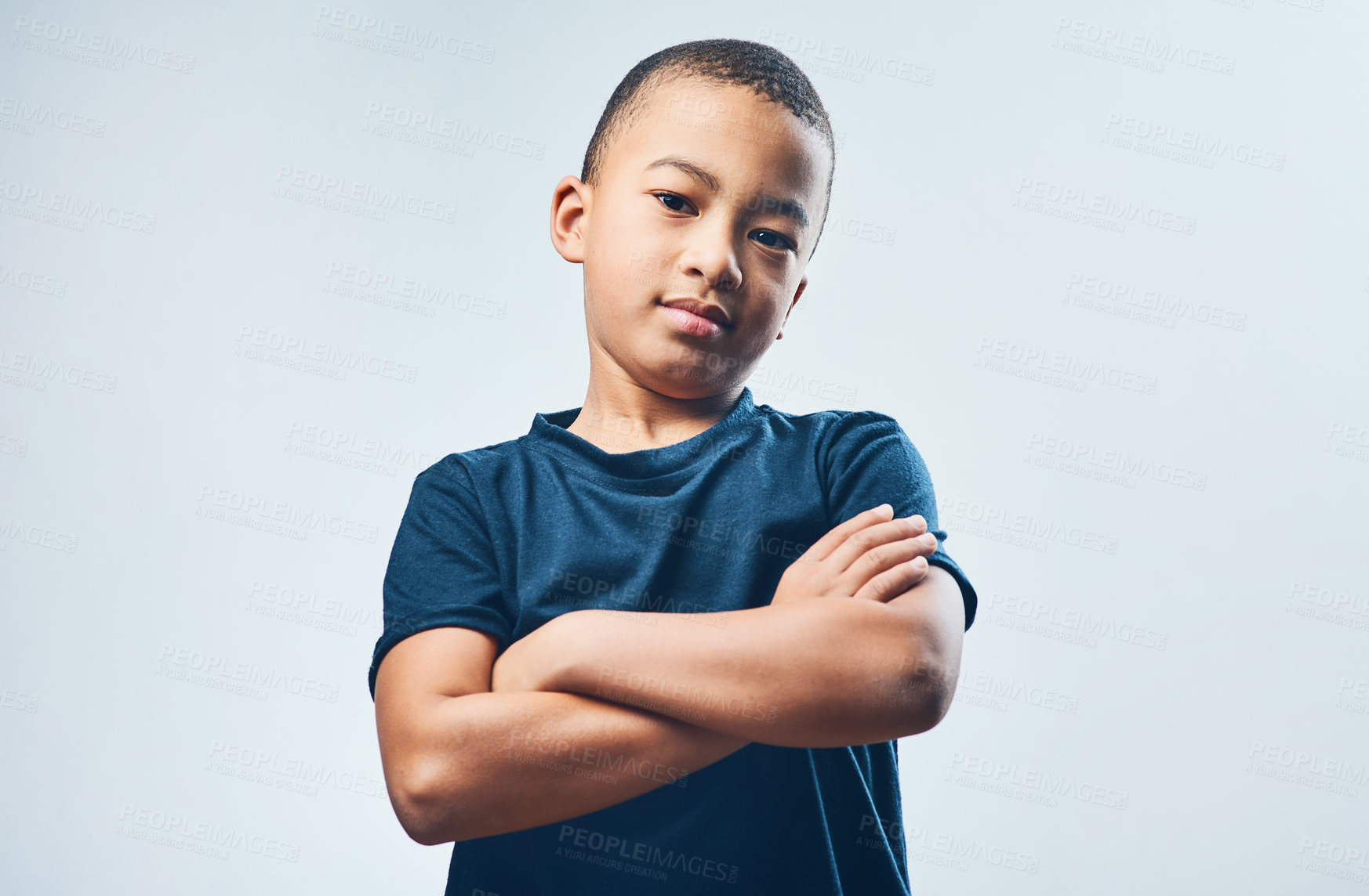 Buy stock photo Child, portrait and confident in studio for growth, attitude and determination for development. Kid, boy and arms crossed on white background space with casual fashion, behavior and student in Brazil