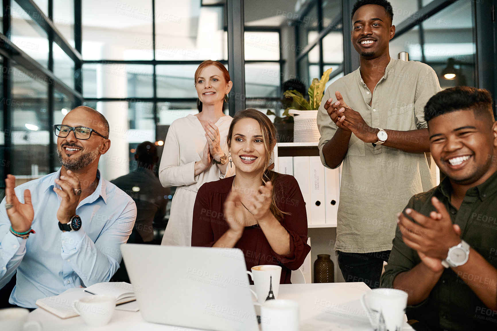 Buy stock photo Clapping and cheering business people happy at a design conference. Diverse creative group of designers excited by a goal or idea during a presentation or speech, showing support and unity 