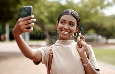 Buy stock photo Phone selfie of fashion, style and beauty vlogger smiling for social media content in a park. Wellness, glamour and lifestyle influencer marketing makeup while looking elegant and trendy outdoors
