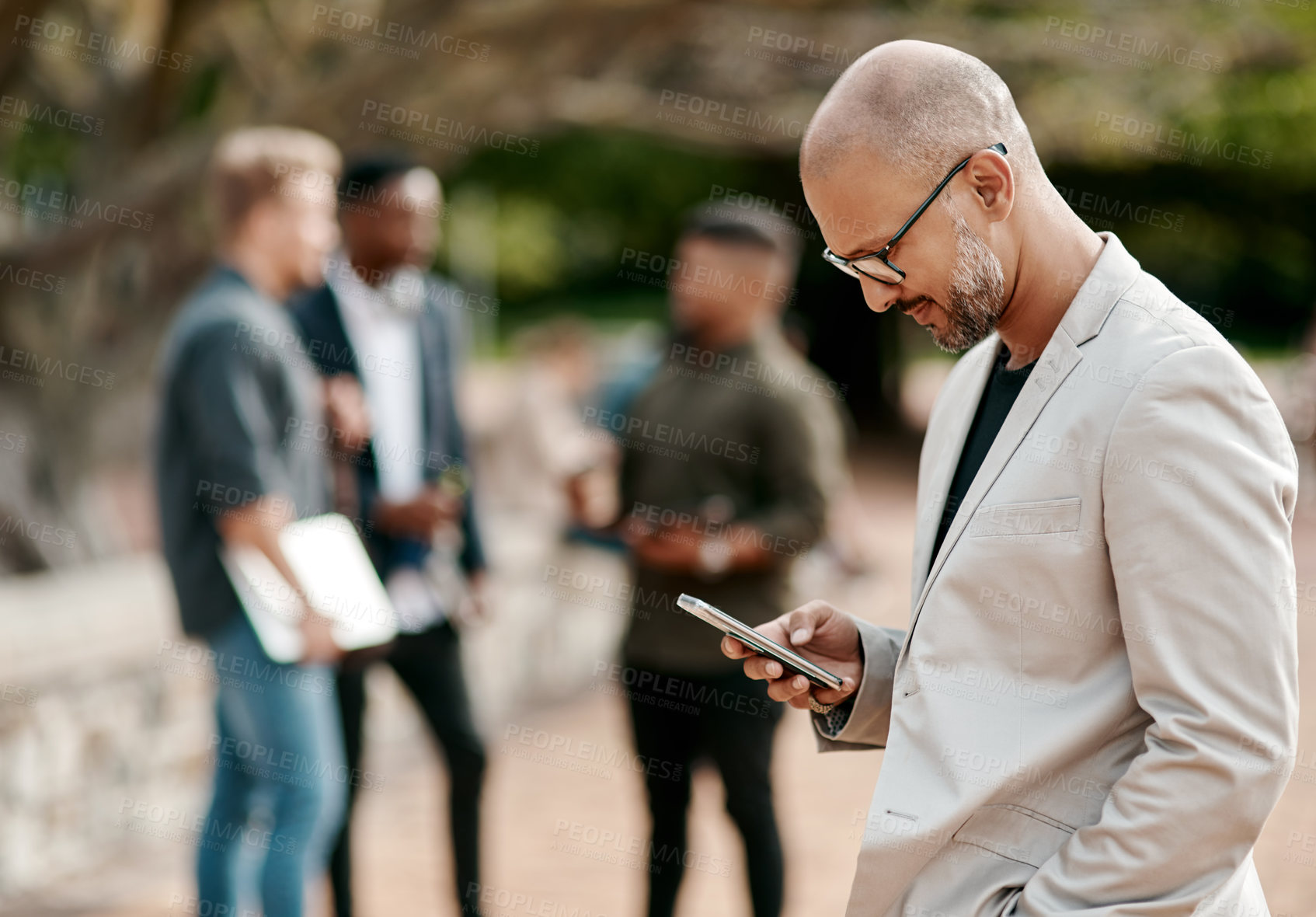 Buy stock photo Businessman, conversation and communication with mobile phone, social networking and app in city. Male person, technology and internet as real estate agent for property development, company or agency