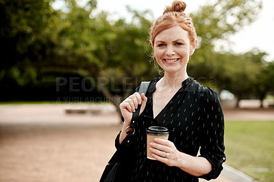 Buy stock photo Portrait of a confident businesswoman enjoying a coffee break in the city