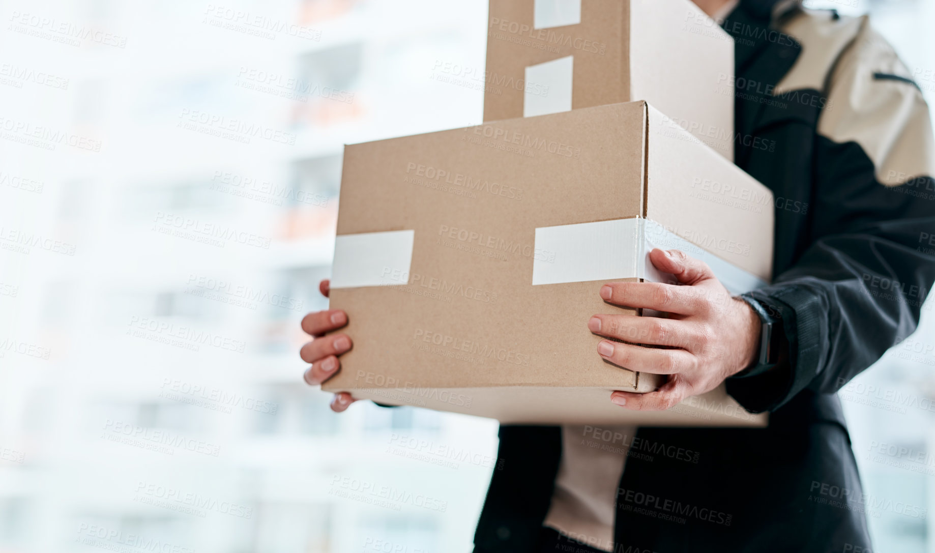 Buy stock photo Cropped shot of a man delivering delivering a package to a place of residence