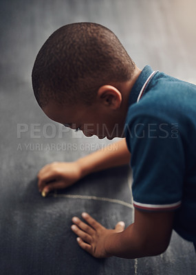 Buy stock photo Blackboard, study and writing with boy student in classroom of school for growth or learning. Chalkboard, development and education with child in lesson for academic knowledge or scholarship