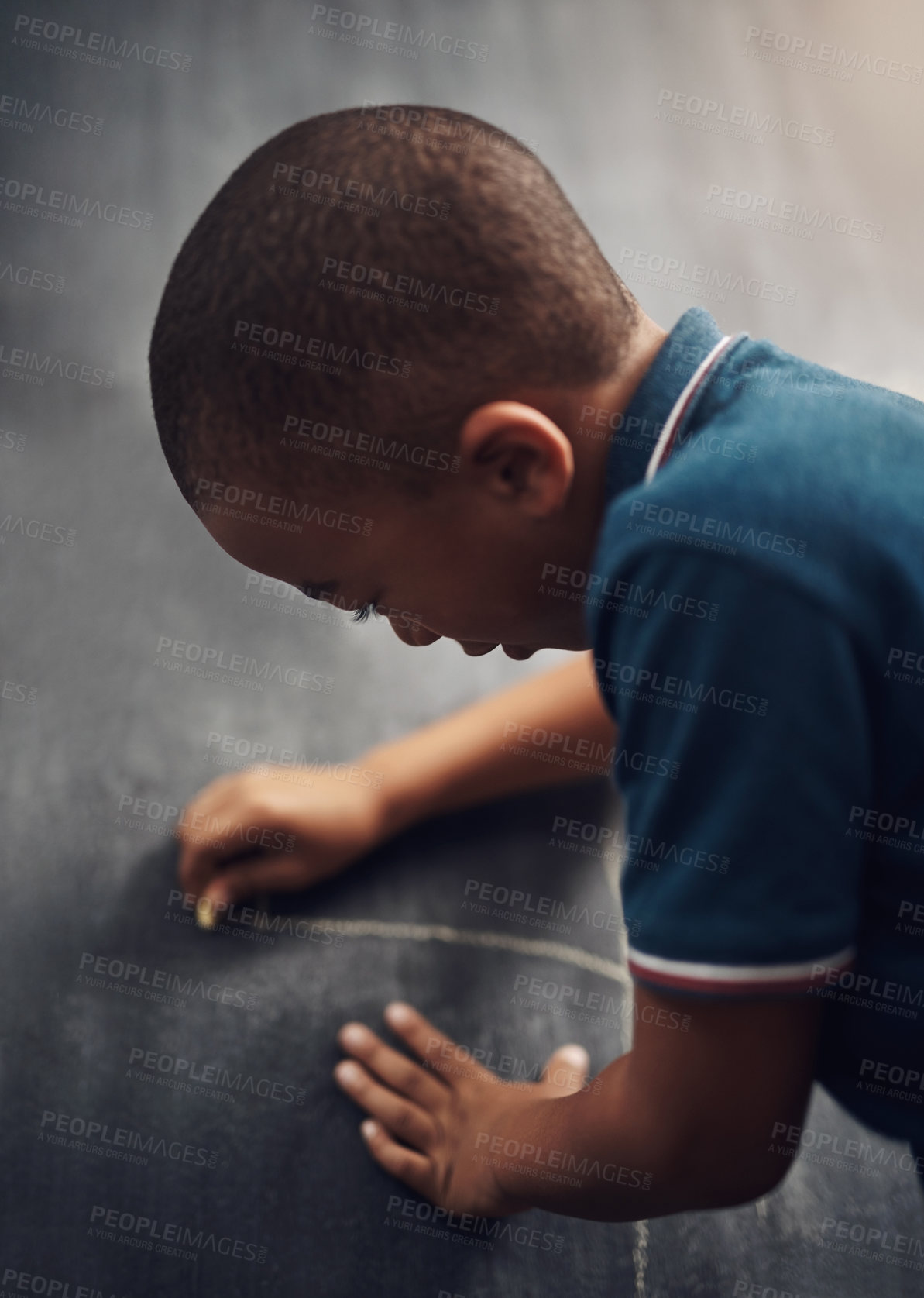 Buy stock photo Cropped shot of a young boy writing on a blackboard at home