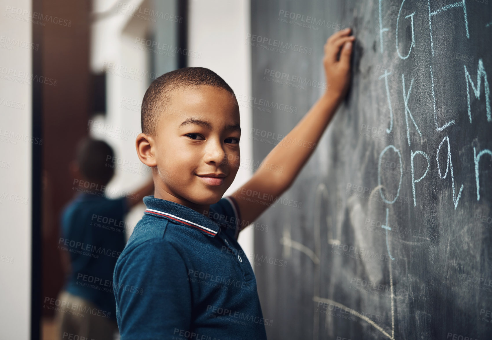 Buy stock photo African boy, portrait and chalkboard for education, learning and development with language writing. Young student, face and drawing letters in school for english lesson, confidence and classroom quiz