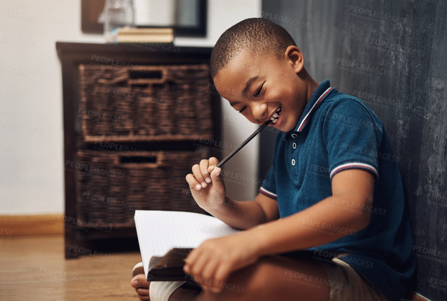 Buy stock photo Boy, thinking and books for studying in home, ponder answer and school preparation for test. Male person, education and student for learning on floor, assessment and contemplating notes for knowledge
