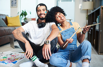 Buy stock photo Couple, portrait and painting with smile on floor for bonding, love and romantic activity together. Happy, man and woman with brush by palette at home for creative date, artistic and hobby on weekend