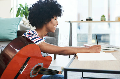 Buy stock photo Woman, musician and song writer with guitar at home for music, production or hobby performance. Girl, talented artist or acoustic guitarist with musical instrument for sound, audio and rhythm notes